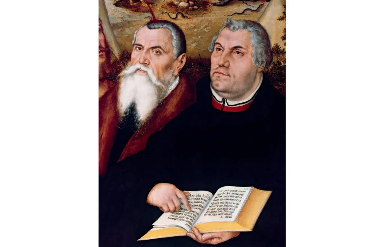 Portret Marcina Lutra i Filipa Melanchtona, wybitne lucas cranach starszy dzieła. Postacie trzymają otwartą księgę z tekstem.
