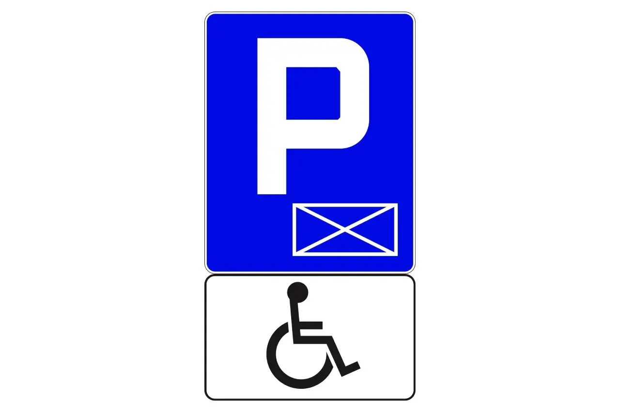 Znak drogowy informujący o miejscu dla niepełnosprawnych, z symbolem koperty. Wymiary miejsca parkingowego dla osób z niepełnosprawnościami są kluczowe.