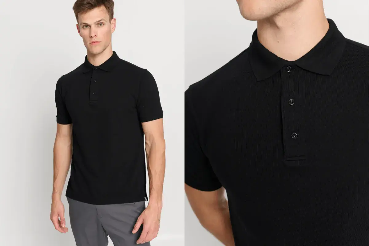 Ein Mann präsentiert ein schwarzes Polohemd, das sich vielseitig kombinieren lässt. Perfekt zu grauen Chinos für einen lässigen Look.