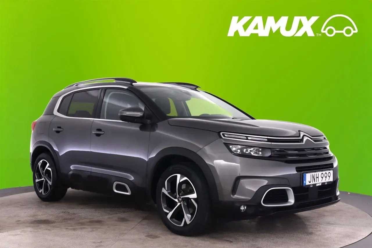 Grå Citroën C5 Aircross begagnad SUV med takräcken och snygga fälgar. Perfekt för familjen som söker komfort och stil.