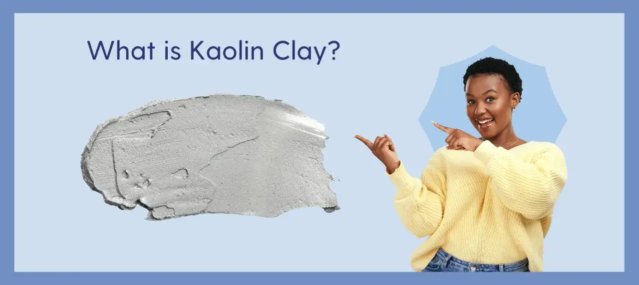 Kobieta wskazuje na grudkę szarej glinki. Dowiedz się, kaolin co to jest i jakie ma zastosowania.