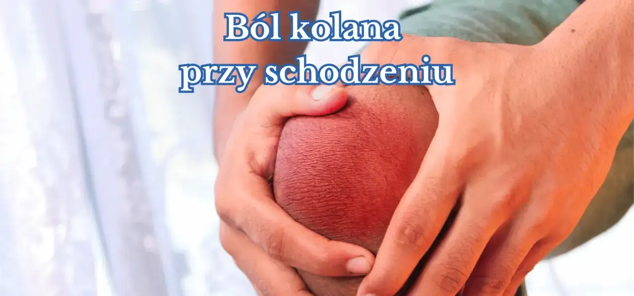 Dłonie obejmujące zaczerwienione kolano, symbolizujące ból kolana przy schodzeniu ze stromych tras.