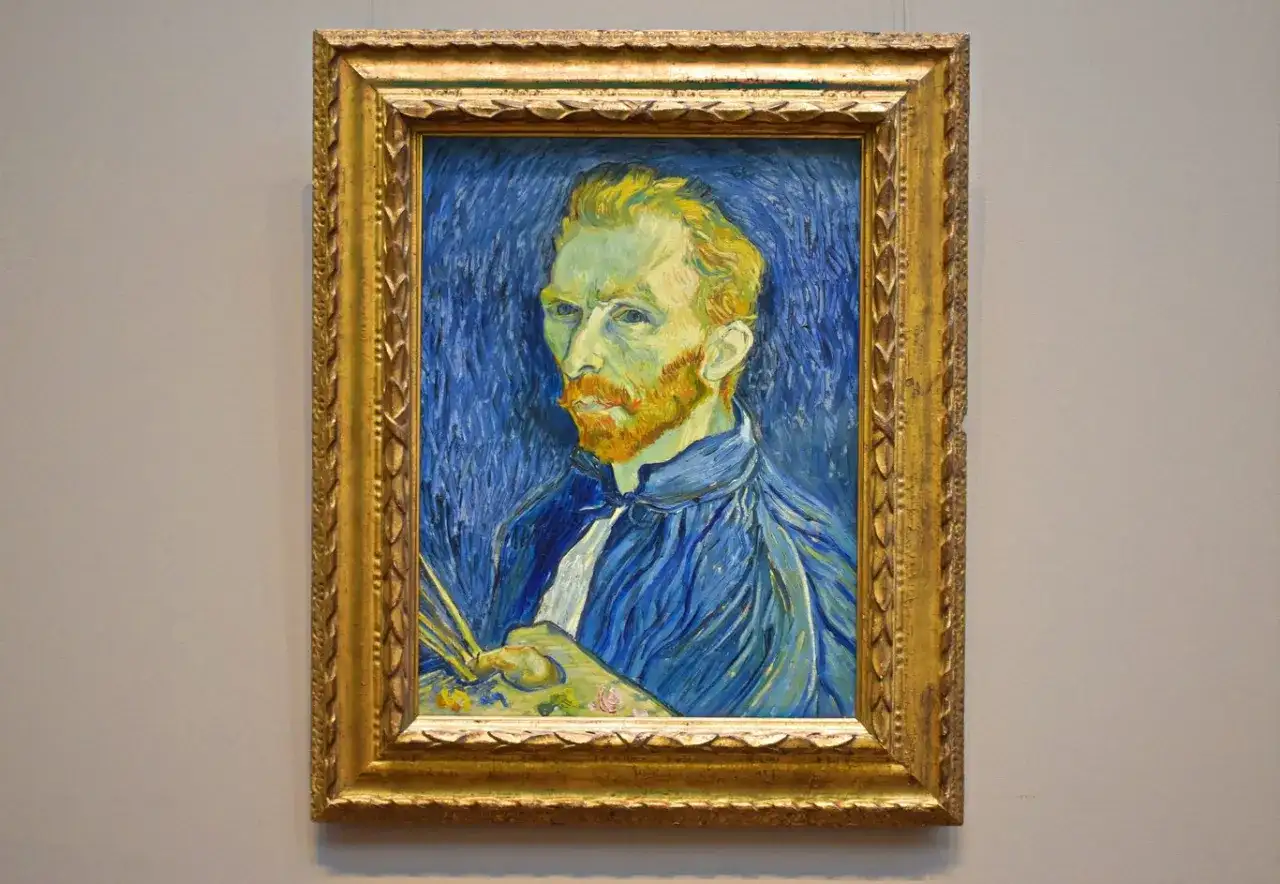 Portret Vincenta van Gogha, artysty, którego burzliwy **van gogh życiorys** inspirował pokolenia. Widać pędzel i paletę, gotowe do uchwycenia kolejnego fragmentu świata.