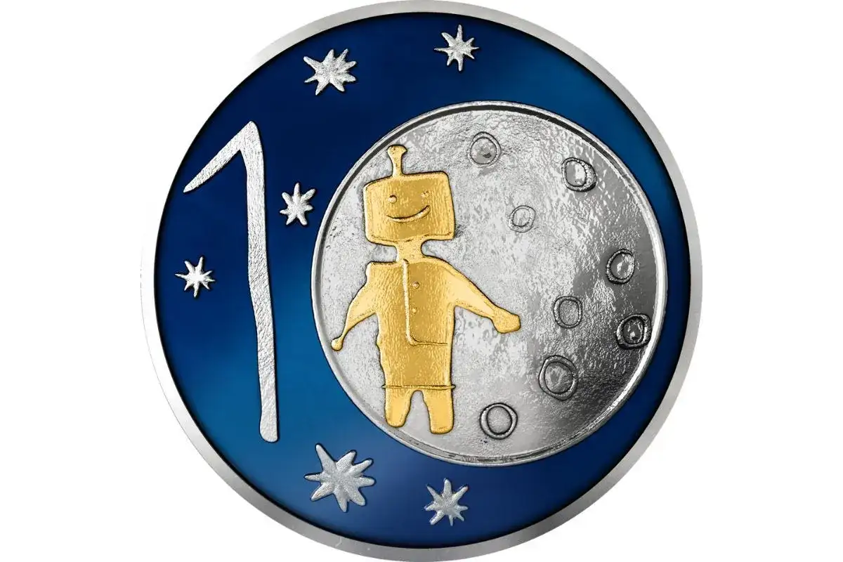 Złoty robot na Księżycu, obok cyfry 1 i gwiazdek. Taka grafika może pojawić się na monecie wyprodukowanej przez mennicę.
