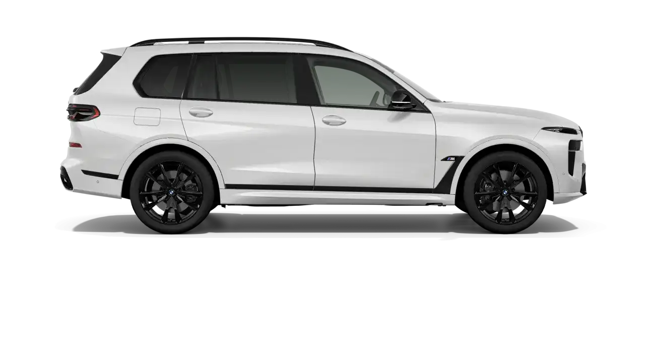 Białe BMW X7 M60i z czarnymi felgami i detalami. Luksusowy SUV gotowy na każdą podróż.