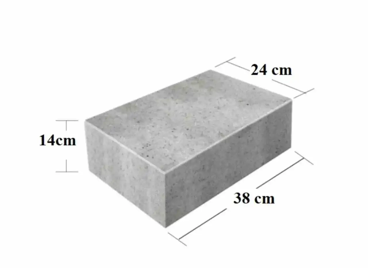 Szary bloczek betonowy z widocznymi wymiarami: 38 cm długości, 24 cm szerokości i 14 cm wysokości.