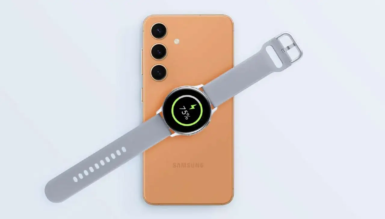 Une montre Samsung est en cours de charger sur un téléphone, affichant 75% de batterie.