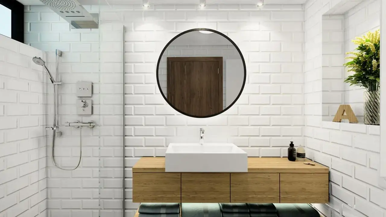 Baño moderno con ducha abierta y lavabo sobre mueble de madera. Explora alternativas a las mamparas de baño para un diseño minimalista.