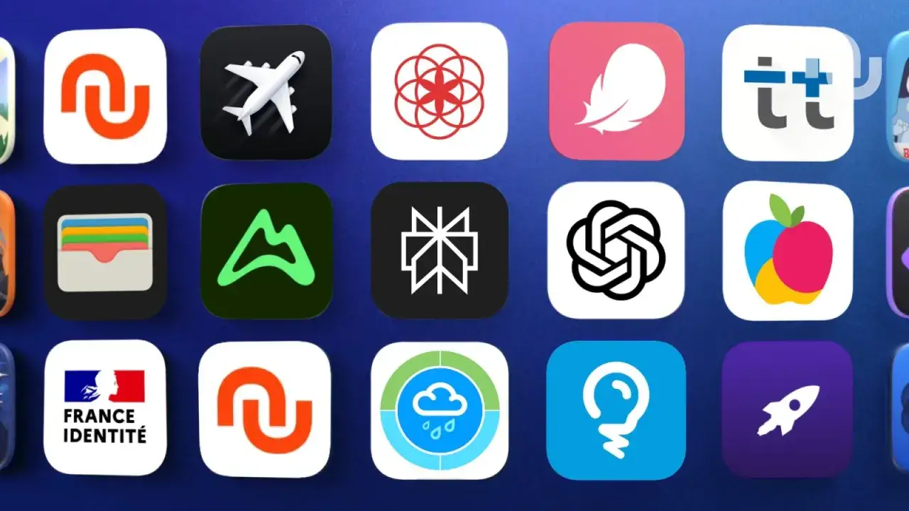 Grille d'icônes d'applications, incluant un avion, un portefeuille, un logo de montagne, et des symboles abstraits. Une mise à jour des applications est en cours.