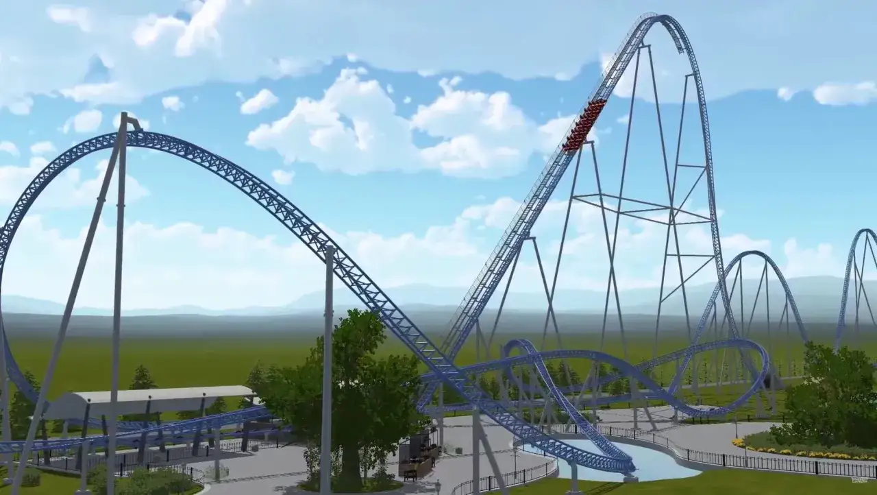Kolejka górska Hyperion Energylandia z wagonikami wjeżdżającymi na wysoki tor.