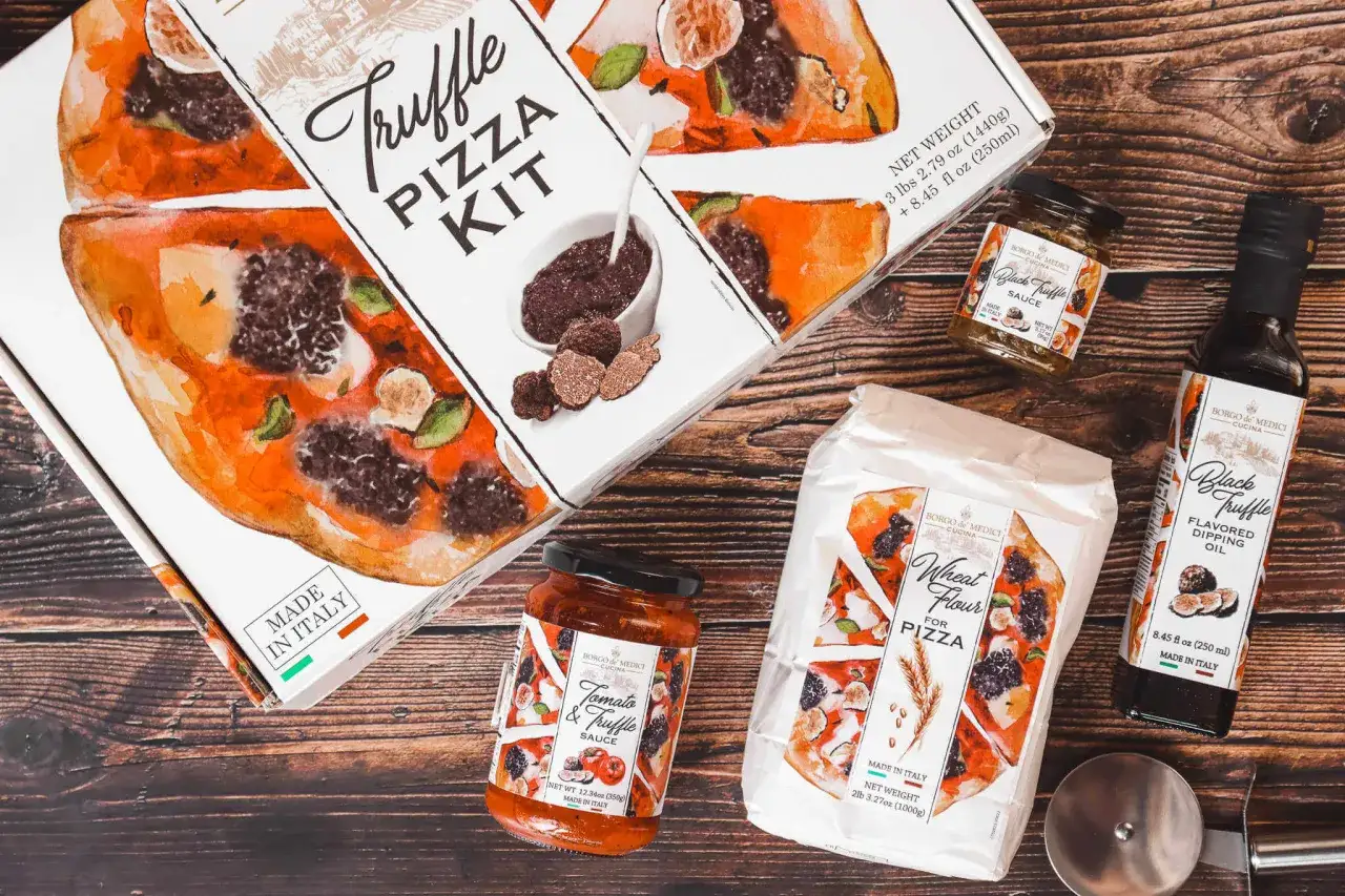 Zestaw do pizzy z truflami: mąka, sos pomidorowo-truflowy, oliwa truflowa i świeże trufle.