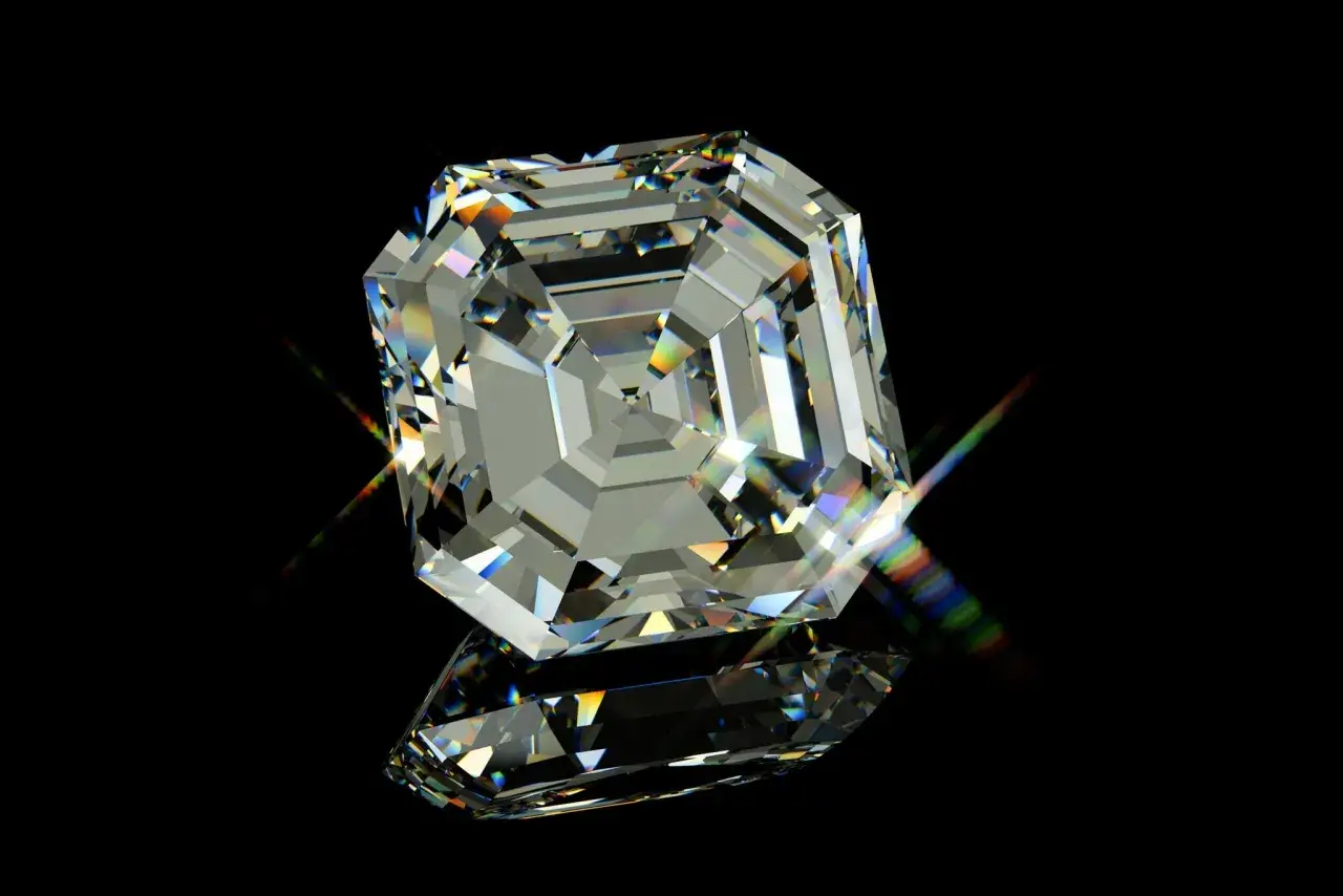 Ein geschliffener Diamant mit vielen Facetten, der das Licht in allen Farben bricht. Man fragt sich, wie viele Facetten hat ein Brillant, um solch ein Funkeln zu erzeugen.