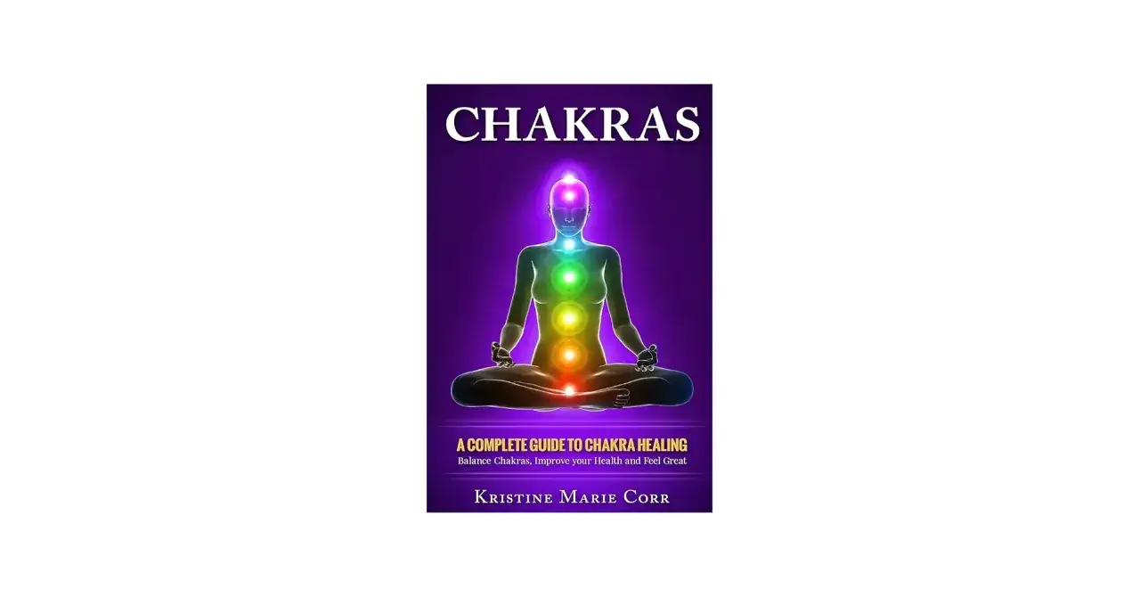 Okładka książki "Chakras" z sylwetką w pozie medytacyjnej i kolorowymi czakrami.