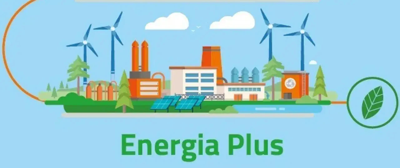 Ilustracja przedstawia nowoczesną fabrykę z turbinami wiatrowymi i panelami słonecznymi, symbolizującą program Energia Plus i ekologiczne rozwiązania.