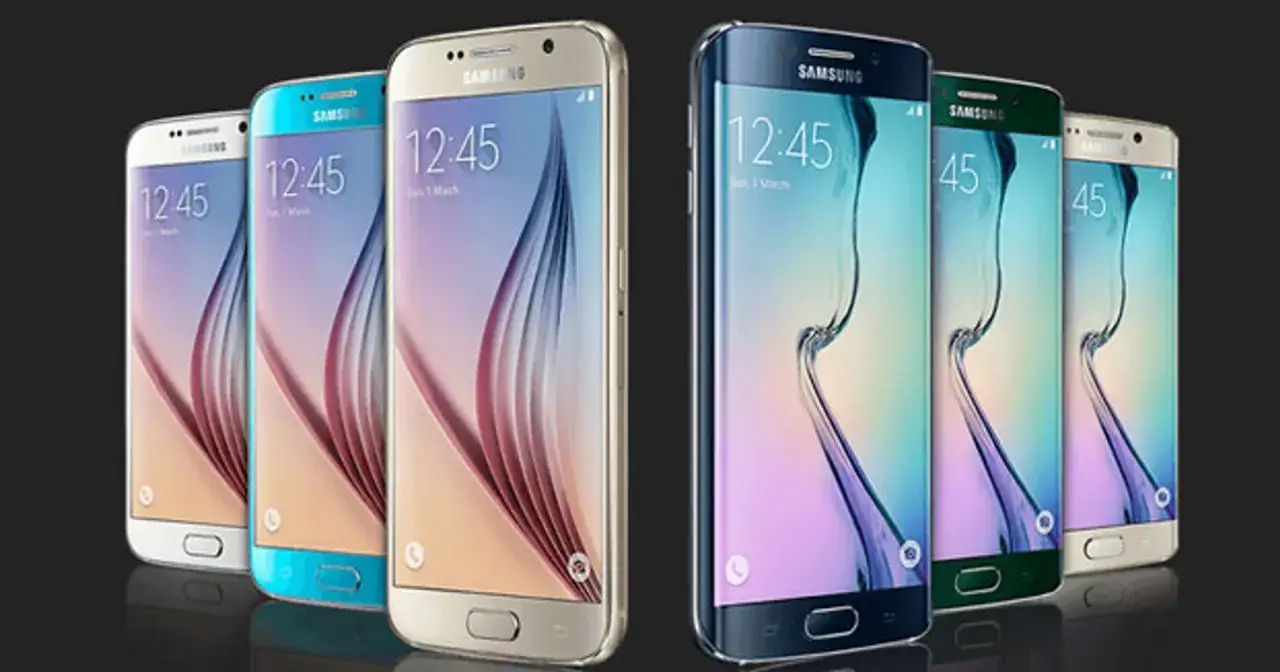 Kilka smartfonów Samsung Galaxy S6 w różnych kolorach, ustawionych obok siebie.