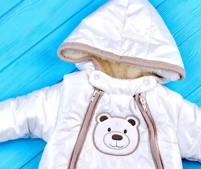 Kombinezon dla noworodka: Rozmiar 62 czy 56? Wybierz mądrze!