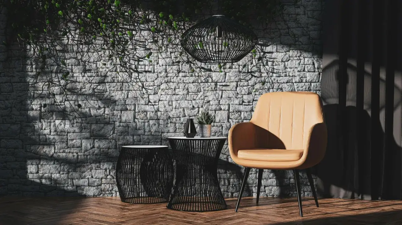Oświetlony kamień dekoracyjny, krzesło, stoliki i rośliny. Dowiedz się, jak odnowić kamień dekoracyjny, by uzyskać taki efekt.
