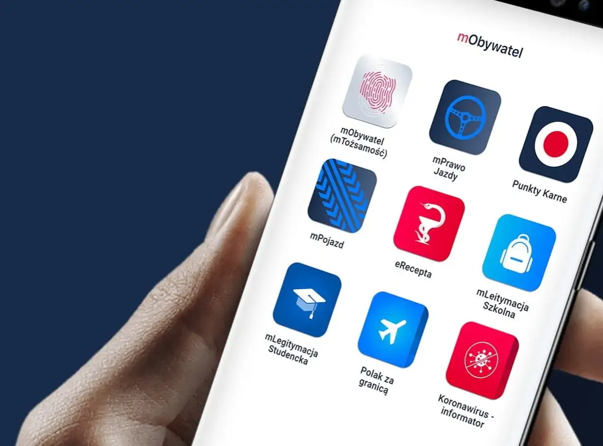 Ekran telefonu z aplikacją mObywatel. Widoczne ikony: mTożsamość, mPrawo Jazdy, Punkty Karne, mPojazd, eRecepta, mLegitymacja Szkolna, mLegitymacja Studencka, Polak za granicą, Koronawirus - informator. Dowiedz się, jak zaktualizować mObywatel.