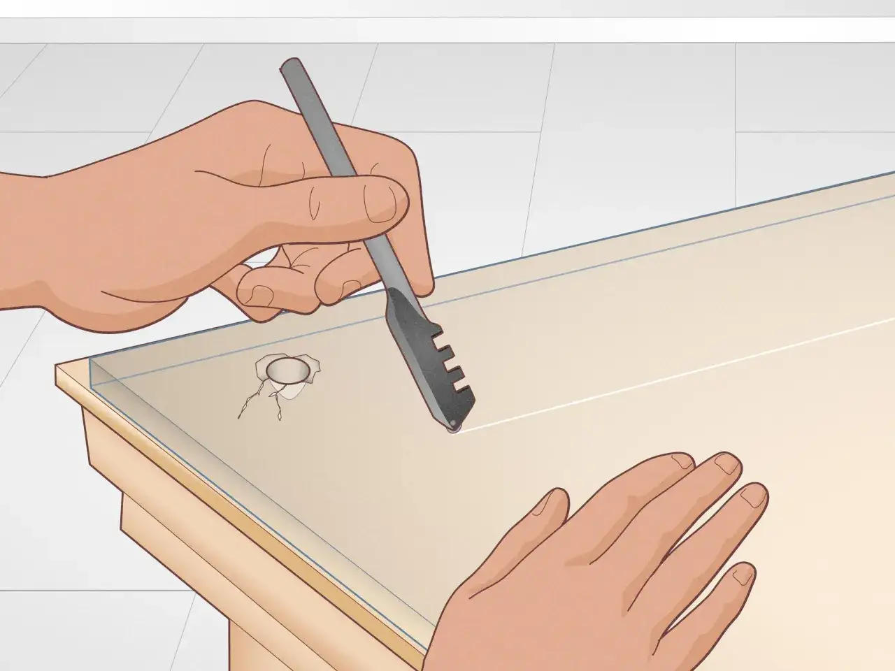 Dwie ręce trzymają narzędzie do cięcia szkła, aby wywiercić otwór w szkle.