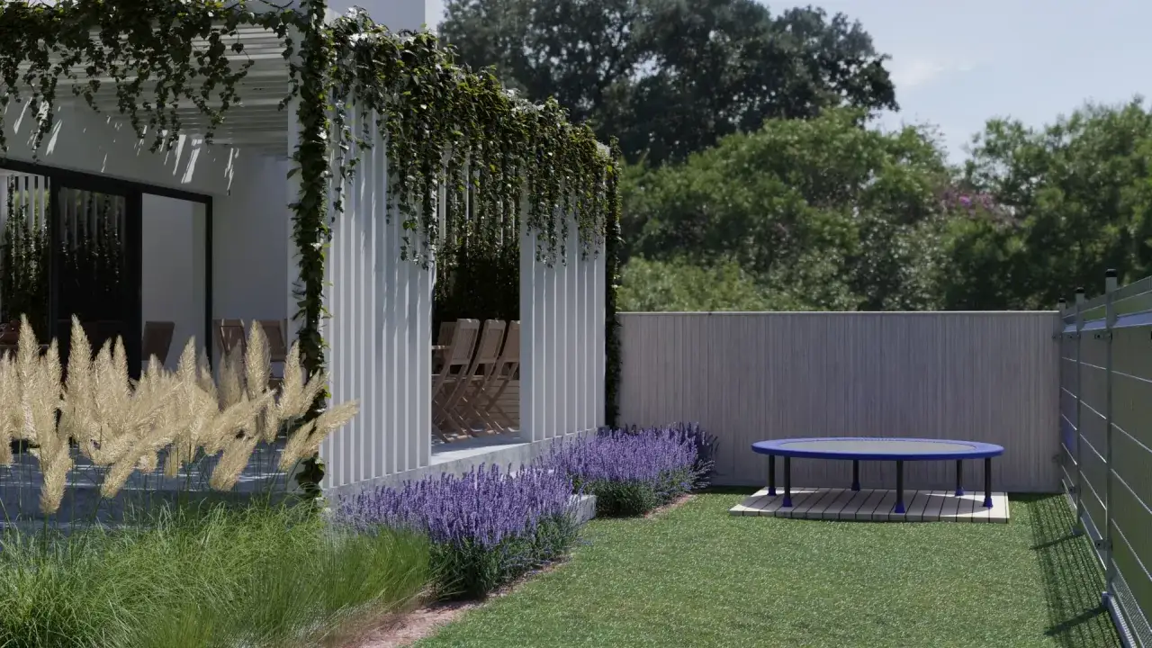 Nowoczesne małe ogrody aranżacje: pergola z pnączami, trawy ozdobne, lawenda i trampolina na trawniku.