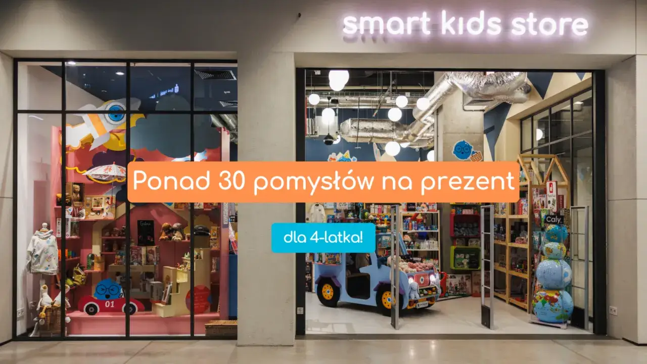 Witryna sklepu z zabawkami "smart kids store" z pomarańczowym napisem "Ponad 30 pomysłów na prezent" i niebieskim "dla 4-latka!".