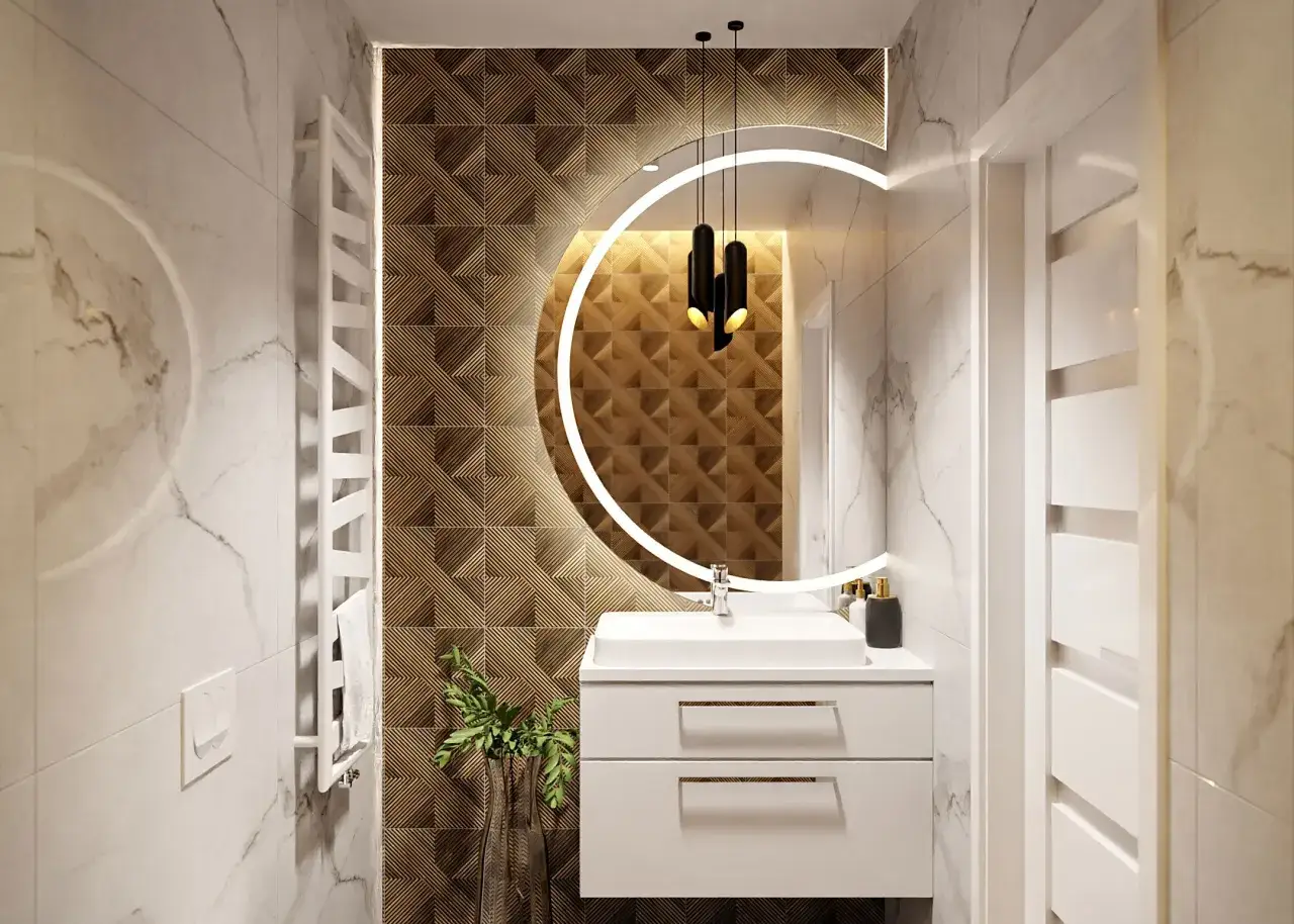 Nowoczesna łazienka z umywalką i szafką, nad którą wbudowane lustro w płytki z podświetleniem.