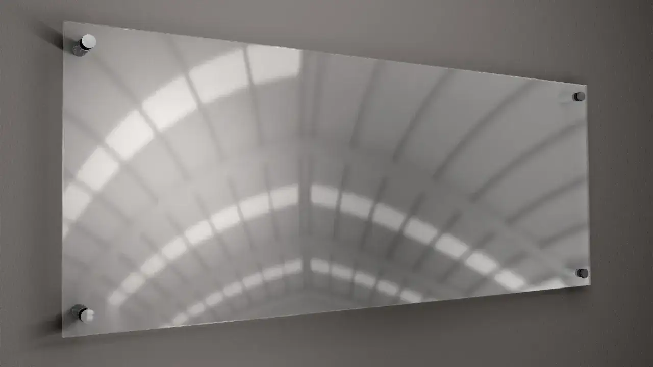 Przezroczysta płyta akrylowa mocowana na dystansach, co zamiast szyby w witrynie. Odbija światło i architekturę wnętrza.