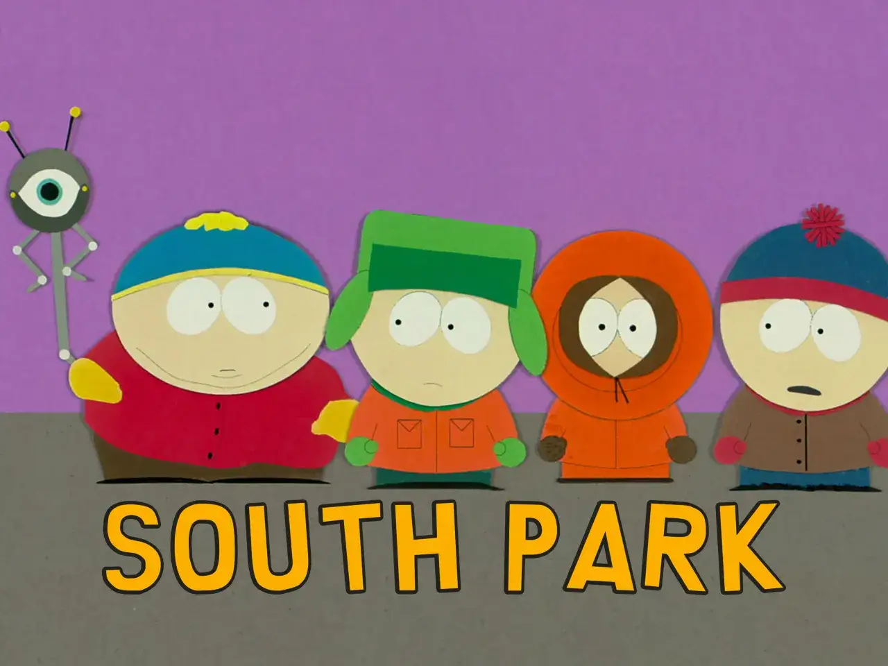 Czterech chłopców z South Park po polsku: Cartman, Kyle, Kenny i Stan, obok robota z okiem.