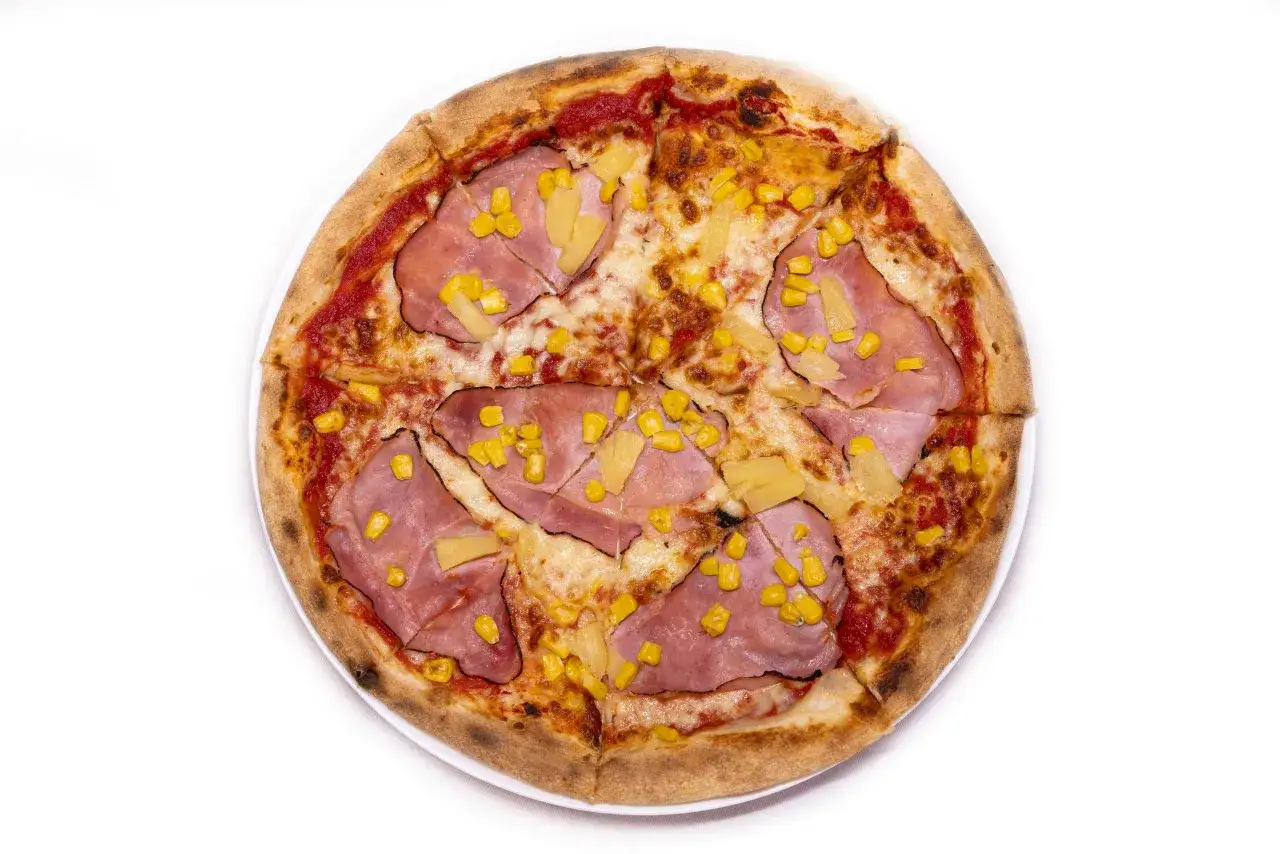 Pizza hawajska z czym jest? Odkryj sekrety jej składników i smaku