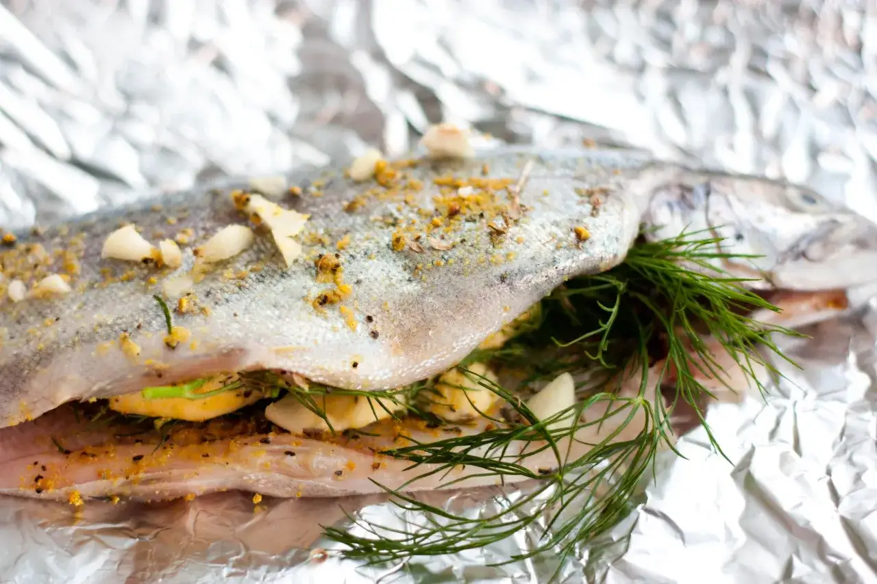 Jaką temperaturę wybrać do pieczenia pstrąga w piekarniku?