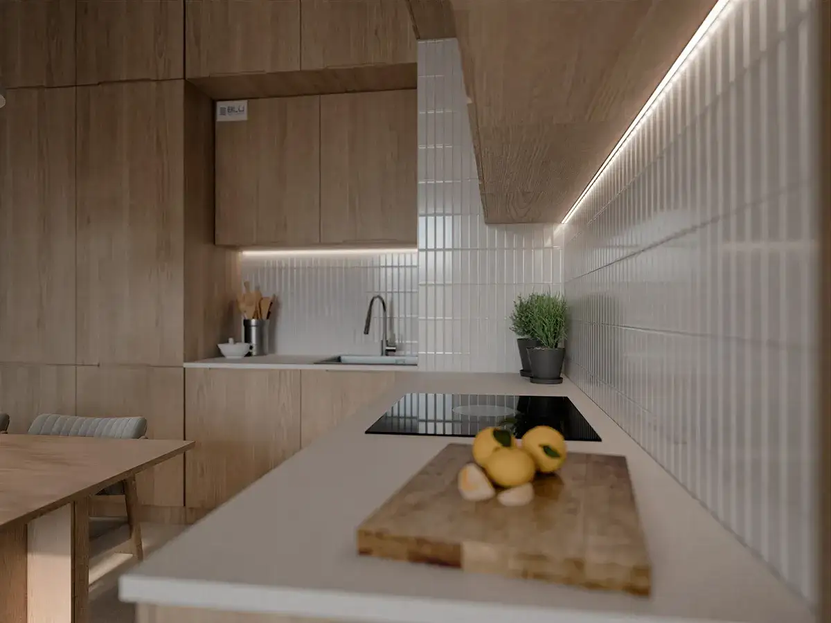 Białe, pionowe płytki między szafkami w kuchni, tworzące elegancką mozaikę.