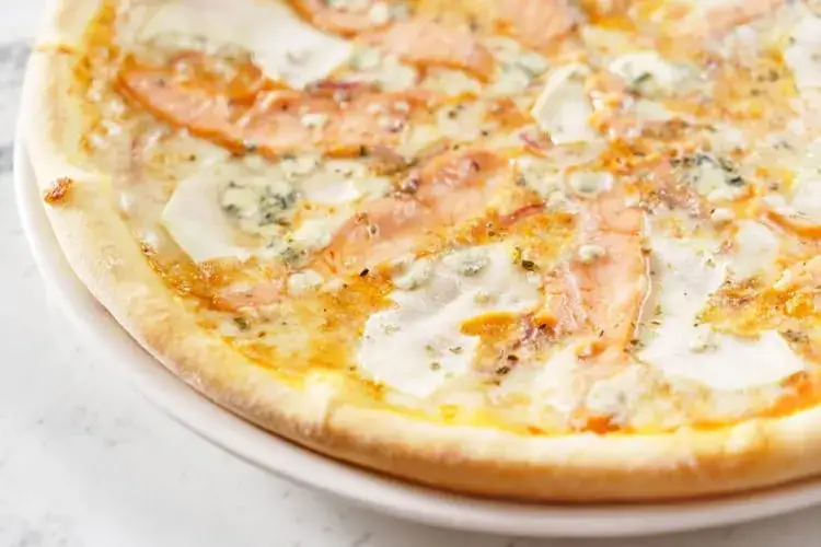Pizza saumon : la recette crémeuse et ses secrets pour réussir