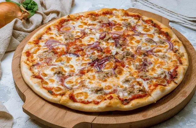 Pizza thon crème fraîche : la recette anti-détrempée et gourmande