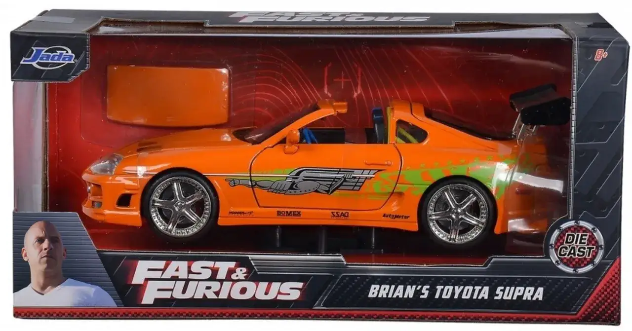 Pomarańczowa Toyota Supra Briana z Szybkich i Wściekłych w pudełku. Zastanawiasz się, ile kosztuje Toyota Supra?