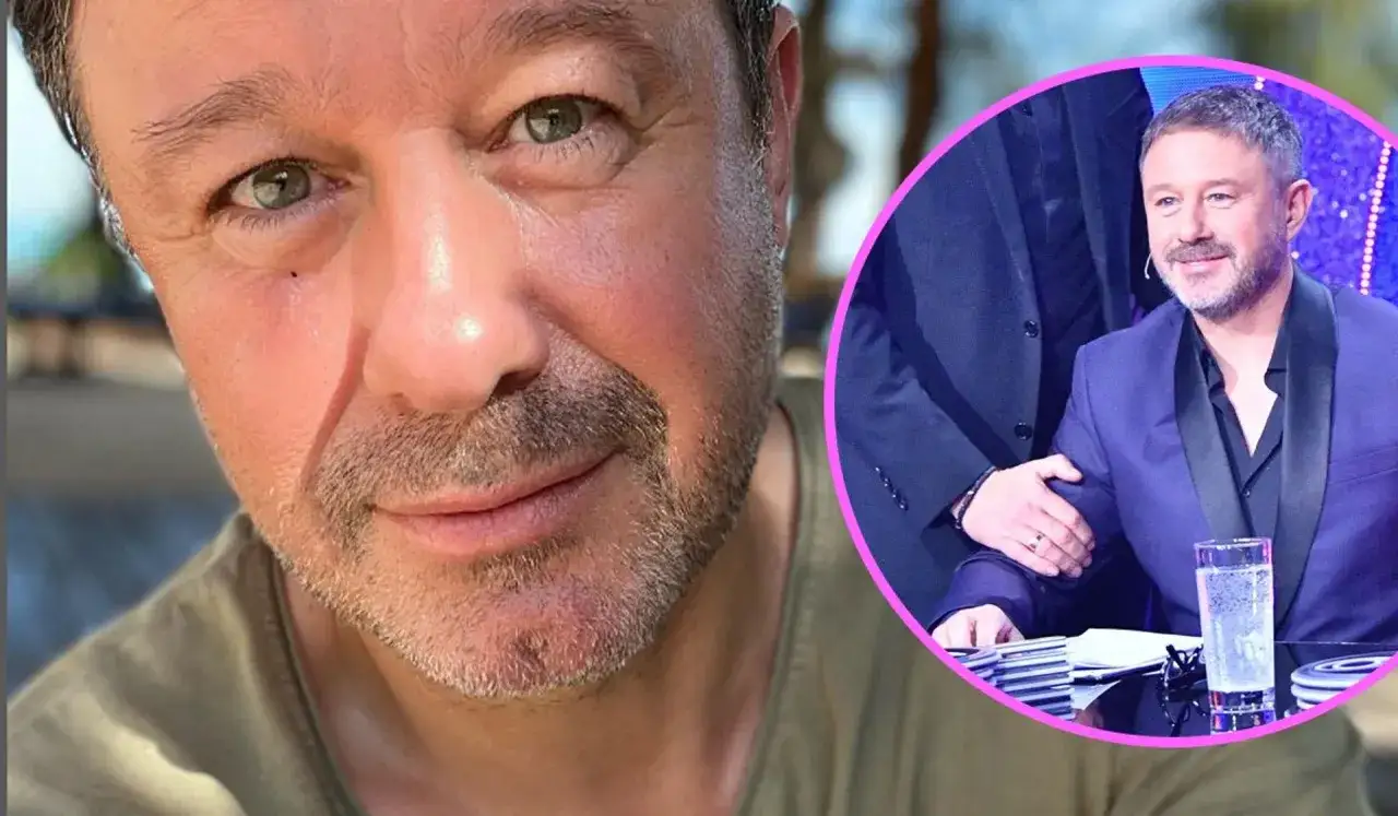 Andrzej Piaseczny w eleganckim garniturze, z pierścionkiem na palcu, budzi pytania: czy Andrzej Piaseczny jest w związku?