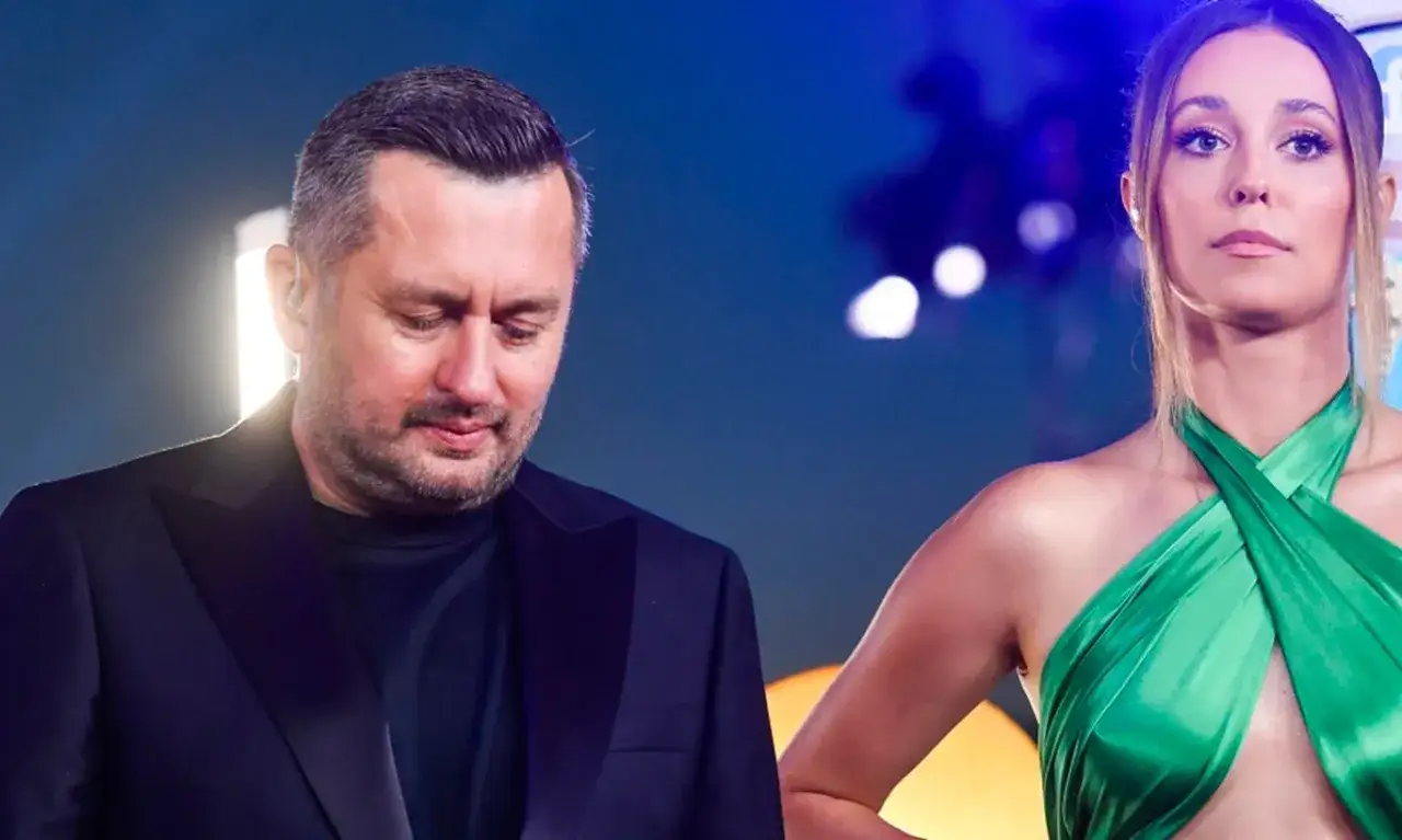 Mężczyzna w czarnym garniturze i kobieta w zielonej sukni. Czy zastanawiasz się, izabella krzan ile zarabia?