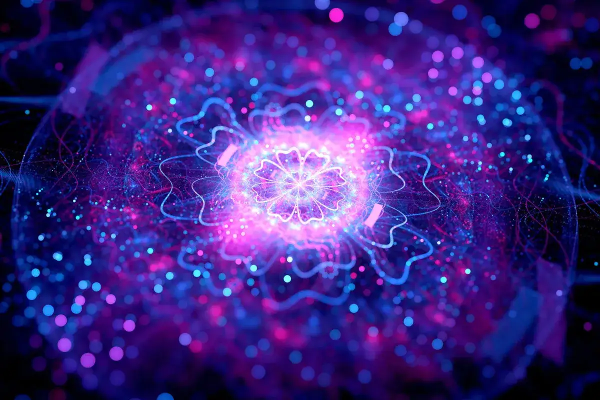 Abstrakcyjna, świetlista struktura w kolorach niebieskim i fioletowym, przypominająca kwiat lub cząstkę.
