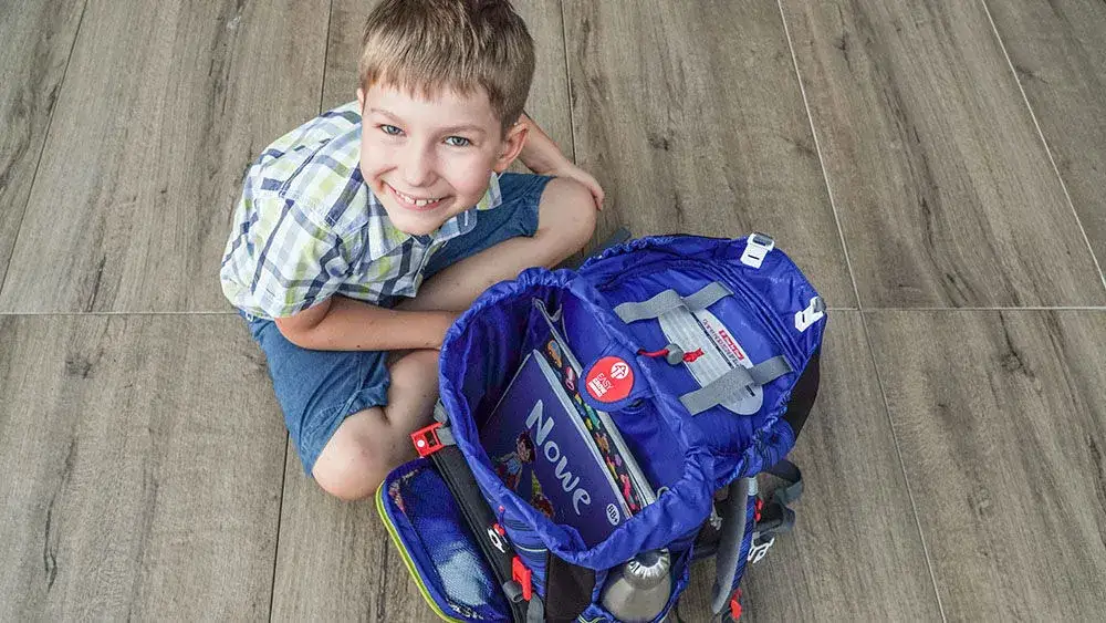 Tornister do 1 klasy: Jak wybrać, by chronić kręgosłup dziecka?
