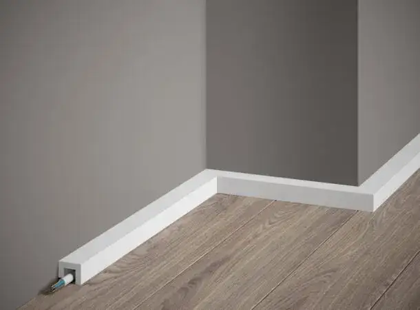 Poznaj skuteczne sposoby czym przyklejać listwy przypodłogowe - porady eksperta