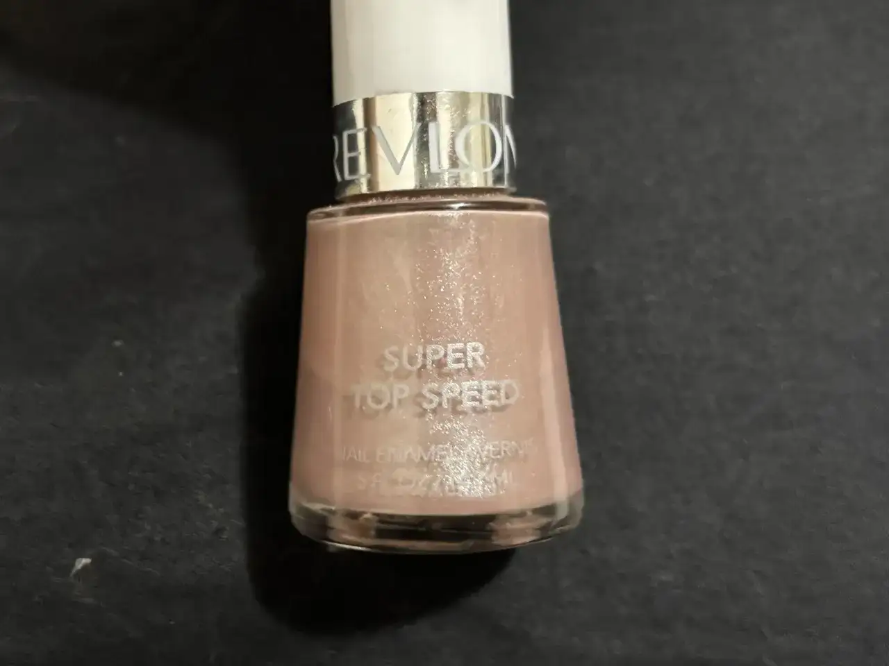 Butelka lakieru do paznokci Revlon Super Top Speed. Szkoda, że te **farby Revlon wycofane** z produkcji, bo były świetne.