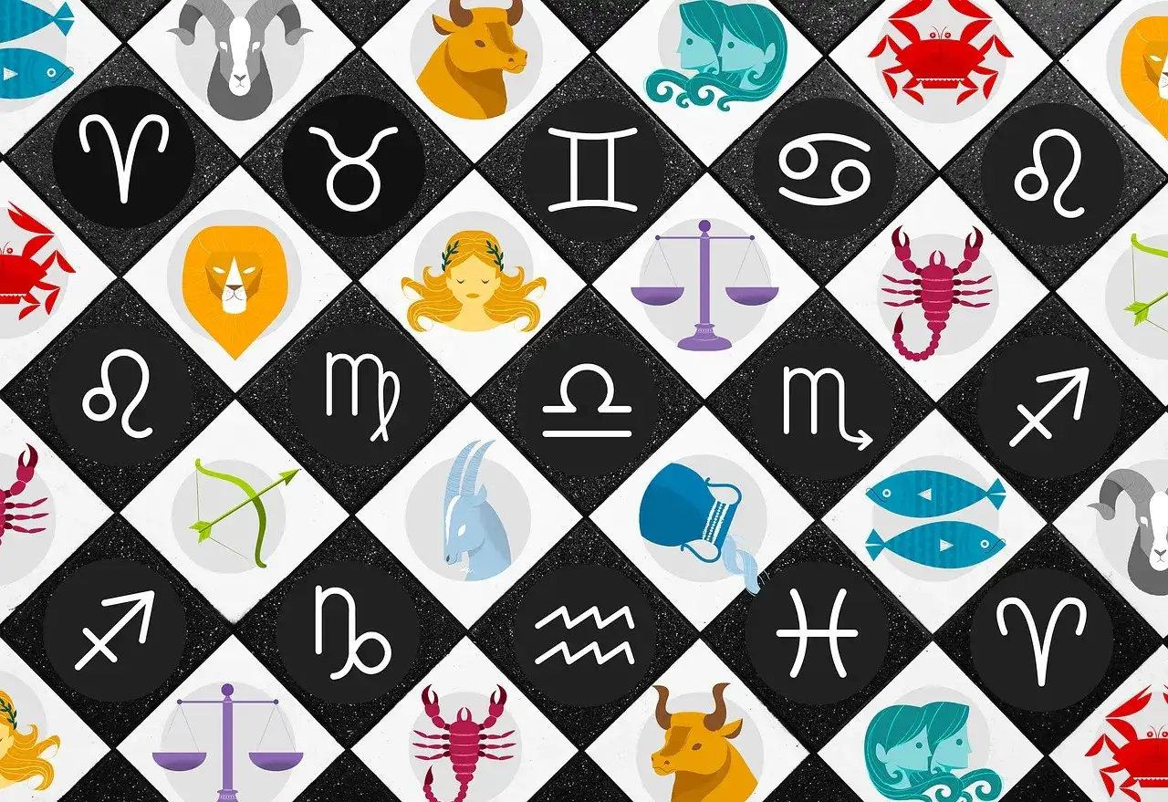 Znak zodiaku **październik** to Waga lub Skorpion. Wizerunki wszystkich znaków zodiaku na czarno-białej szachownicy.