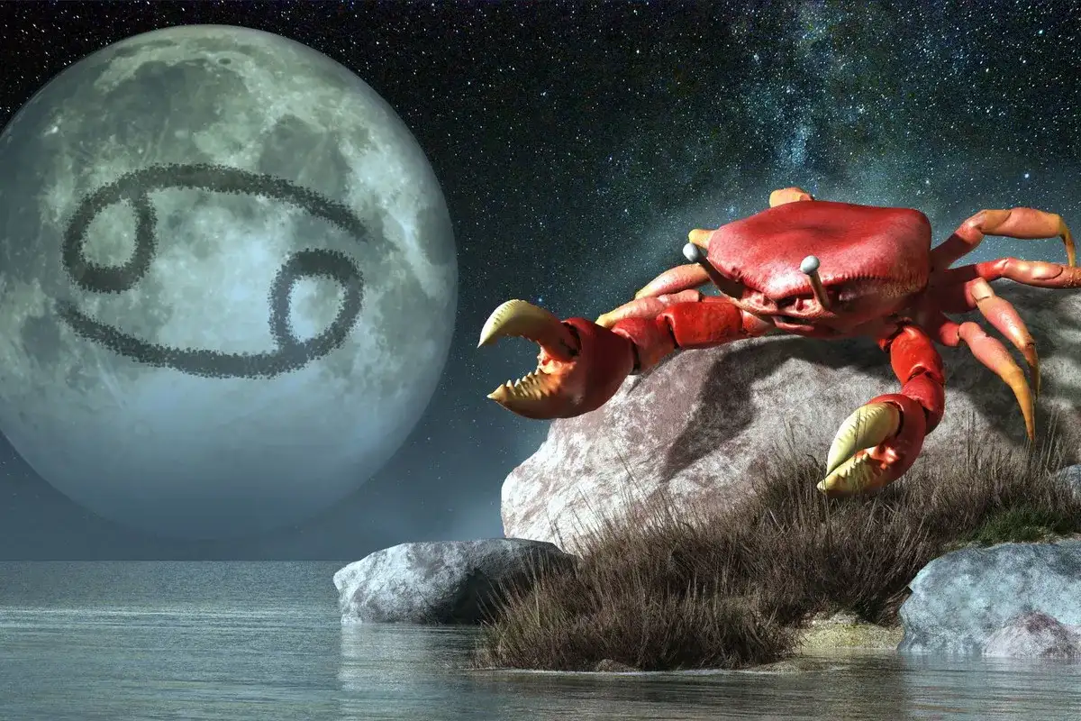 Czerwony rak na skale, księżyc z symbolem Raka i nocne niebo. Ascendent w Raku.