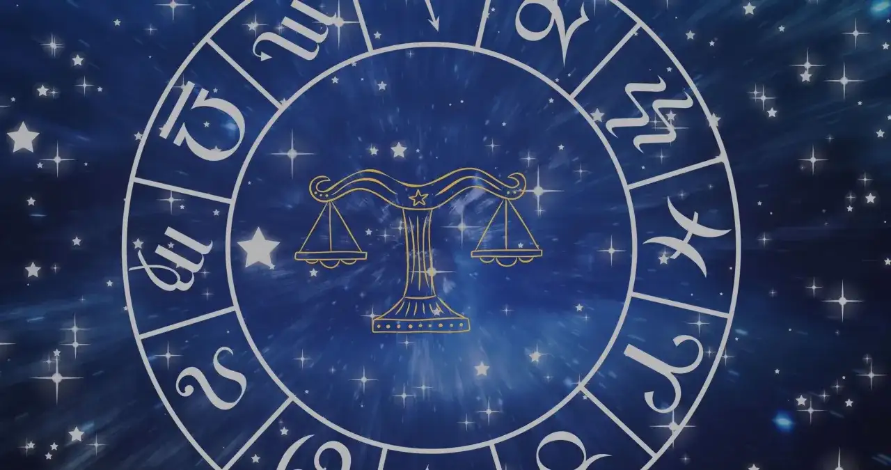 Zodiakalny krąg z wagą pośrodku i symbolami znaków powietrznych na tle gwieździstego nieba.