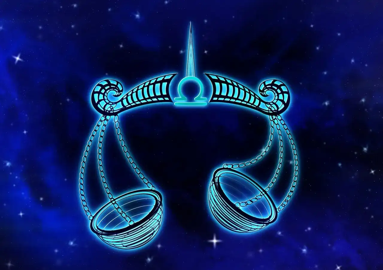 Neonowy symbol Wagi, 24 września znak zodiaku, lśni na tle nocnego nieba pełnego gwiazd.