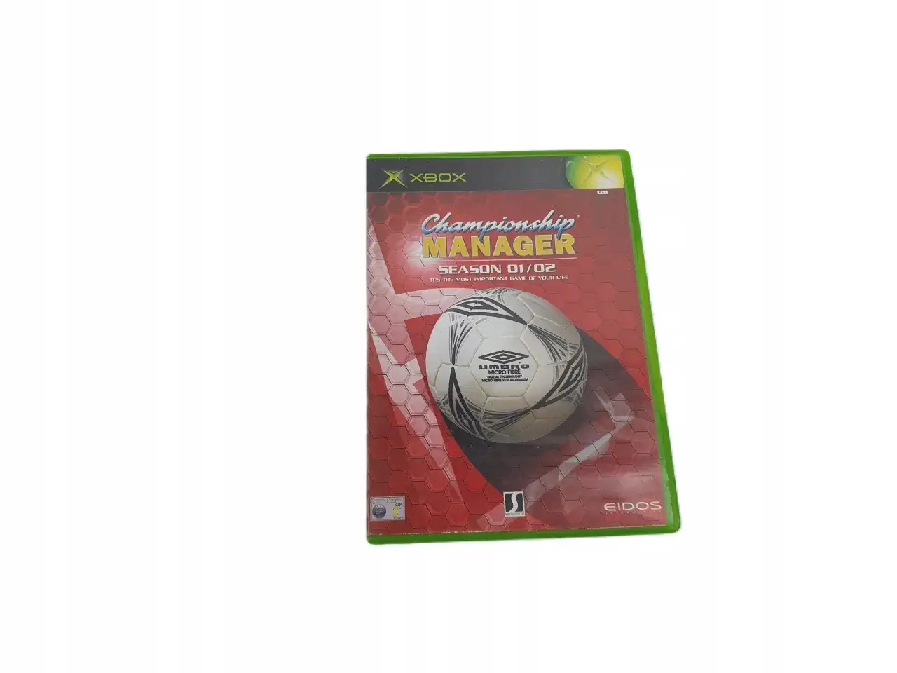 Okładka gry Championship Manager 01/02 na konsolę Xbox z piłką nożną.