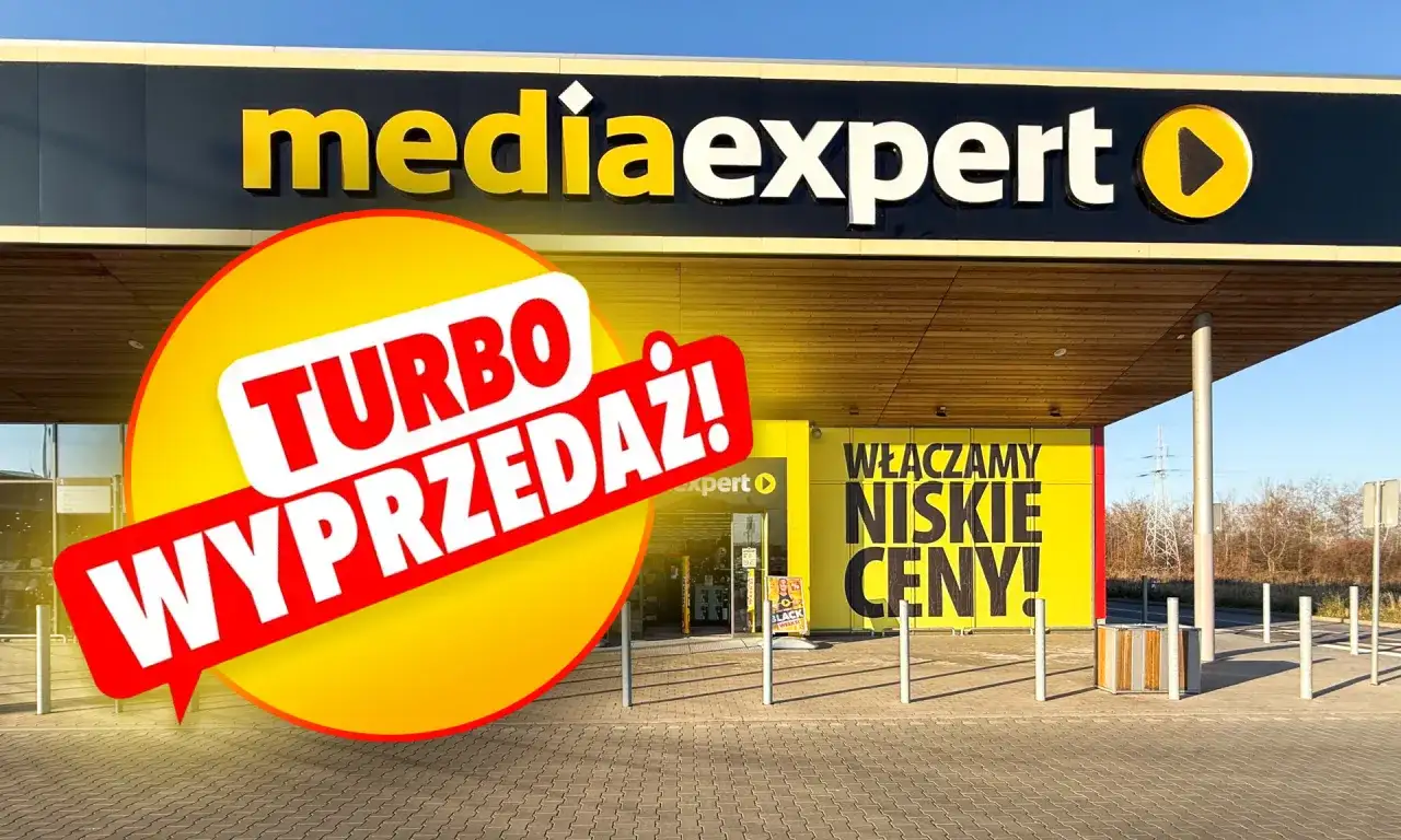 Logo Media Expert z napisem "Turbo wyprzedaż!" i hasłem "Włączamy niskie ceny!".