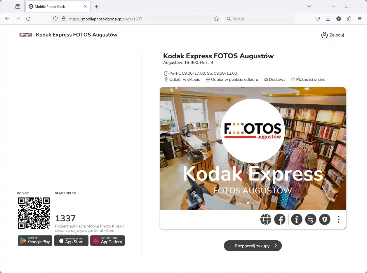 Wnętrze sklepu Kodak Express FOTOS Augustów z półkami pełnymi albumów i akcesoriów fotograficznych.
