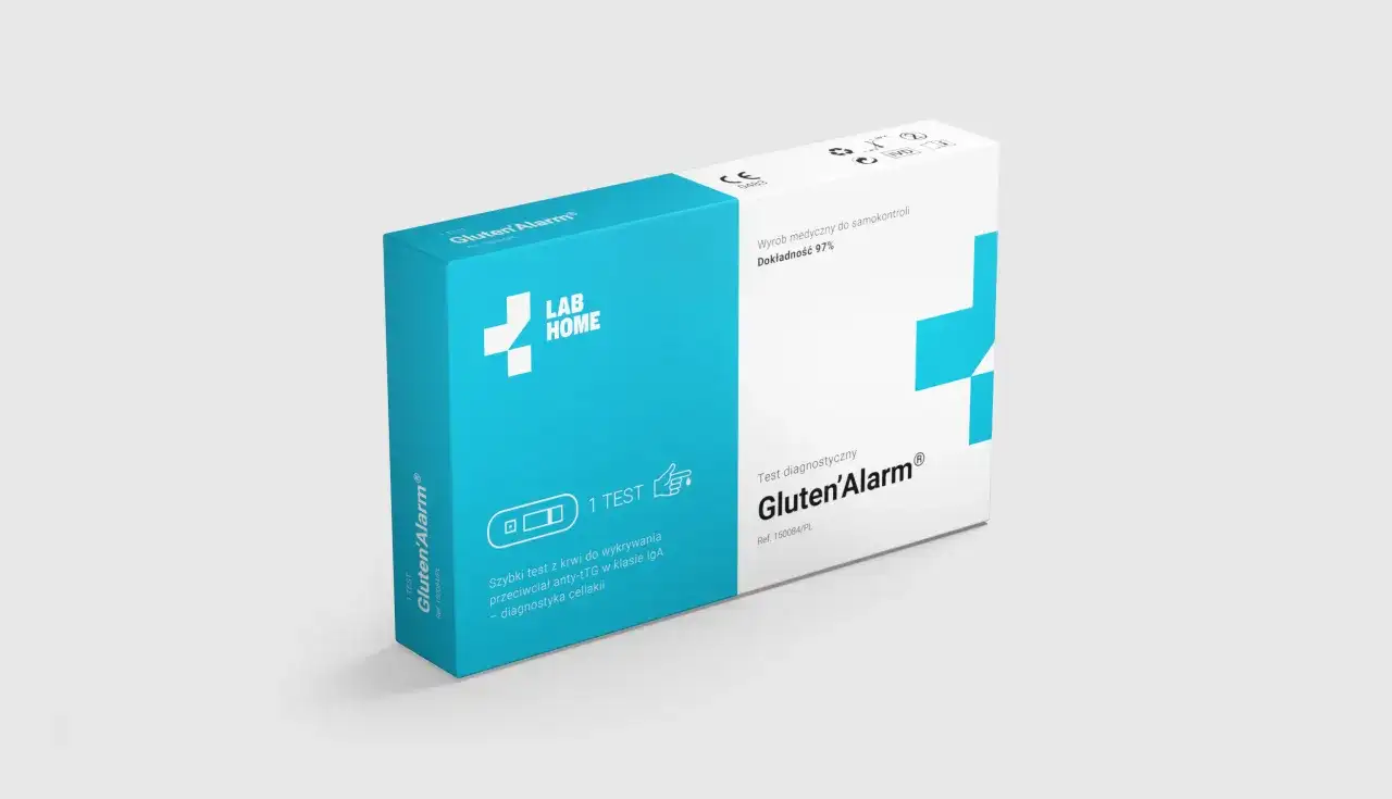 Pudełko testu diagnostycznego Gluten'Alarm do samokontroli, z symbolem krzyża i napisem "LAB HOME".
