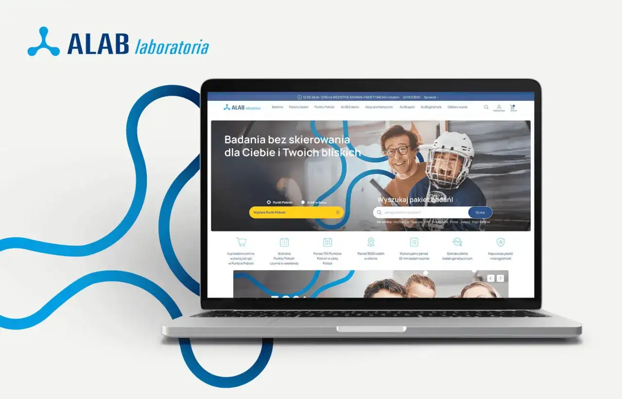 Laptop z otwartą stroną internetową ALAB Laboratoria, prezentującą ofertę badań i wyszukiwarkę pakietów.