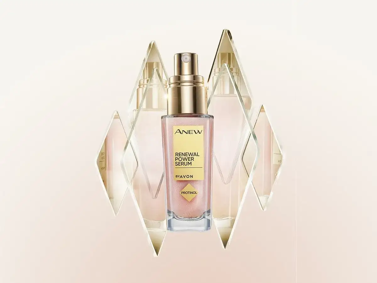 Elegancki koncentrat rewitalizujący do twarzy Avon ANEW Renewal Power Serum z Protinolem, otoczony geometrycznymi kryształami.